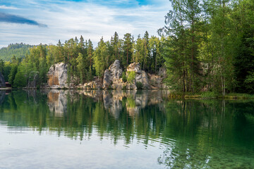 Adrspach, Czech Republic - 20.07.2025: View of the Adrspach-Teplice Rocks with Lake Piskovna. Forest and rocks.