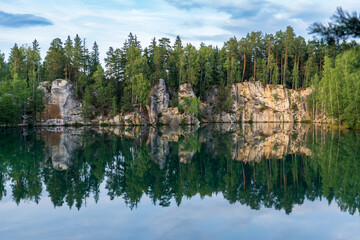 Adrspach, Czech Republic - 20.07.2025: View of the Adrspach-Teplice Rocks with Lake Piskovna. Forest and rocks.