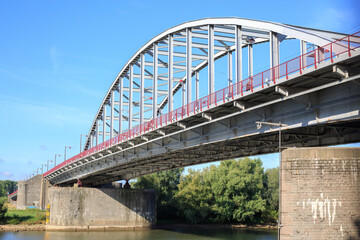 Arnhem bridge is situated on the banks of the Nederrijn, which is a branch of the Rhine River. It is famous for Operation Market Garden during WWII