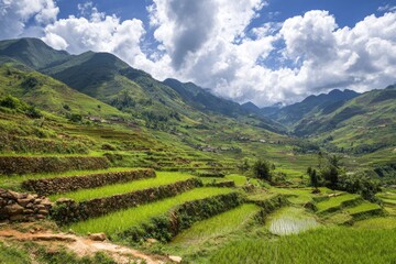 Lush terraced rice paddies ascend verdant mountains under a partly cloudy sky