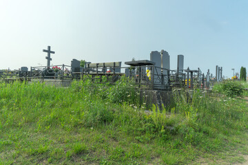 Serene cemetery landscape in summer. Timeless monuments standing guard over cherished memories in a...