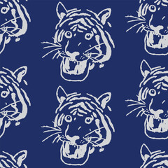 Seamless, Hand drawn brush line bold and stylized roaring tiger faces in distressed white on indigo blue pattern. Japanese and ethnic wood caving, block print vintage animal print background. Simple g