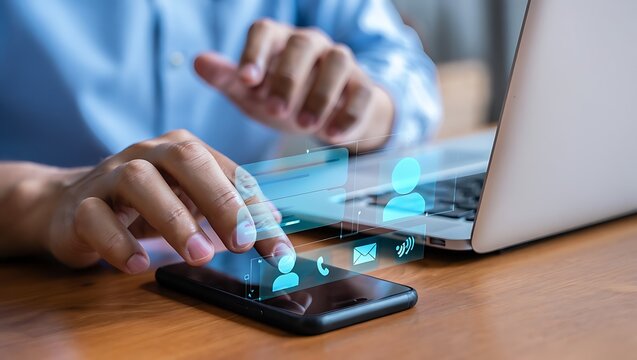 Modern Digital Communication and Technology Concept Person Using Smartphone for Contacting Business Communication Network and Social Media Connectivity with Laptop