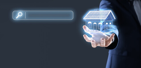 Real estate holding virtual house against dark grey background with search bar, closeup. Searching...