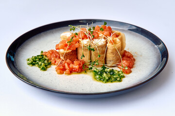 Gourmet Dish Featuring Crispy Tortilla Shells Stuffed with Fresh Ingredients, Garnished with Tomatoes and Microgreens for an Enticing Culinary Presentation