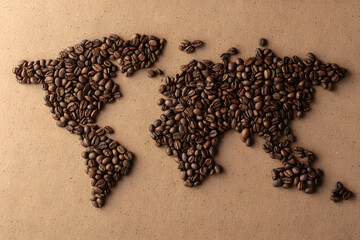 World Map Formed From Coffee Beans on Beige Background. Depicts Concepts of Global Trade, Coffee Production, and International Coffee Day.