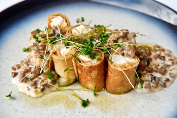 Deliciously Plated Savory Rolls with Creamy Filling and Fresh Microgreens, Highlighting Culinary...