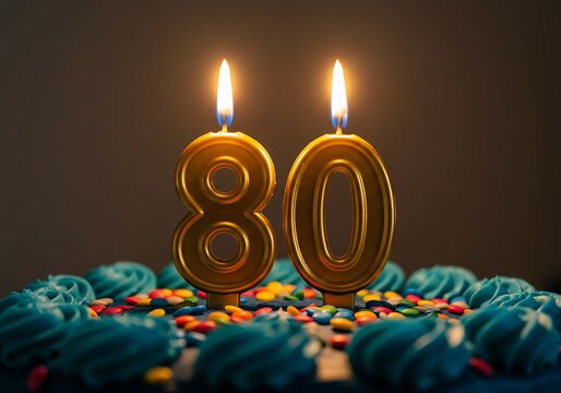 Blue frosted 80th birthday cake with candles