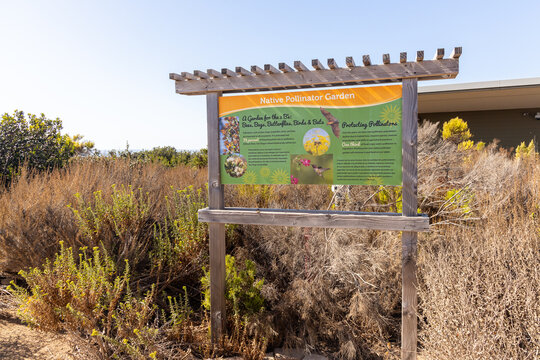 CHULA VISTA, CALIFORNIA - SEPTEMBER 14, 2024:  Sign for the Native Pollinator Garden on one of the many walking trails at the Living Coast Discovery Center.