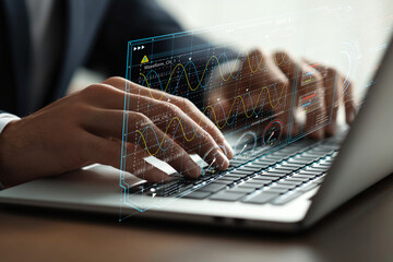 Hands on Laptop with Digital Interface Displaying Data Analysis, Graphs, and Statistics for Technology, Business, and Innovation Themes
