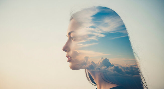 Double Exposure Portrait of a Contemplative Woman Merged with Sky and Clouds