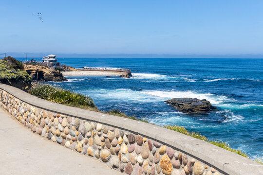 The lifeguard station and the historic La Jolla Children's Pool. The seawall was built in 1931 as a play area for children and to protect them from the waves.  