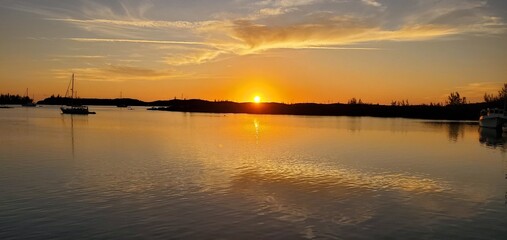 Obraz premium sunset over the river