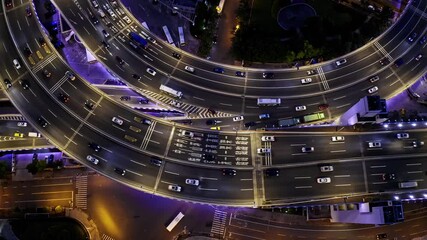 Stunning aerial view of Shanghai city evening rush hour overpass bustling with traffic