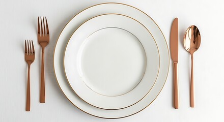 Elegant Table Setting with Rose Gold Cutlery and White Plates