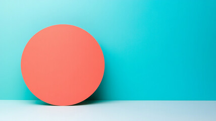 Coral round shape on blue background with soft shadow creating minimalistic and modern design with vibrant color contrast