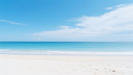 Serene Beach Scene with Clear Blue Sky and Calm Ocean Waves