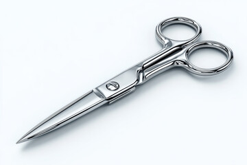 Obraz premium Shiny silver scissors on a white background