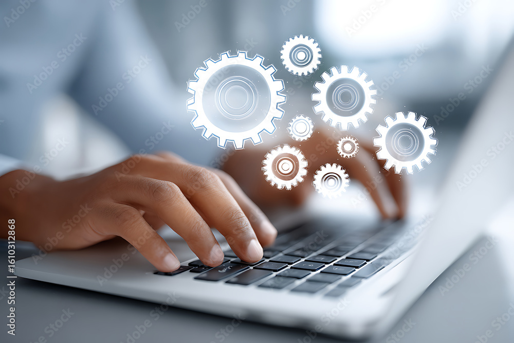 Poster hands working on a laptop with digital gears representing technology and innovation in a modern work