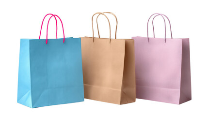 Three paper shopping bags in blue brown and pink with rope handles isolated on a transparent background