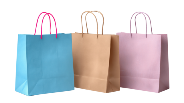 Three paper shopping bags in blue brown and pink with rope handles isolated on a transparent background