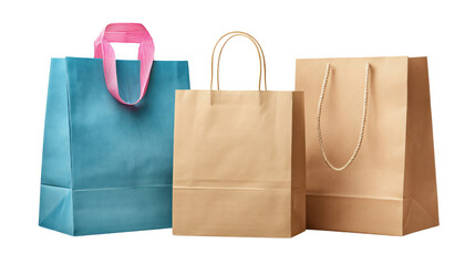 Three shopping bags one blue with pink ribbon handle two brown paper isolated on a transparent background