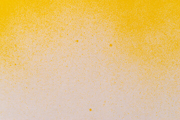 黄色のスプレー塗料で描いた背景