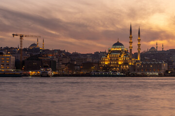 Yeni Mosque on Bosphorus at sunset. Beautiful view of Istanbul