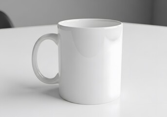 Obraz premium Blank white coffee mug mockup on a white table, a clean template for design and branding.