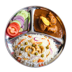Traditional Indian Meal on Silver Plate with Rice, Chicken Curry, and Fresh Vegetables – Top View