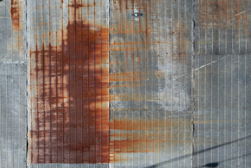 Rust patterns spread across a grid-like metal surface