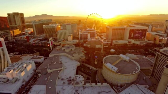The sun rises over the las vegas cityscape and skyline