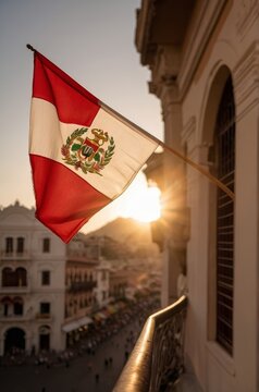 Hand Waving a Peruvian Flag in Lima during Fiestas Patrias
