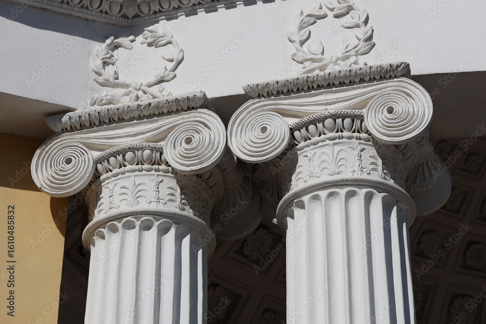 Aufkleber a close-up view of a building featuring two prominent columns