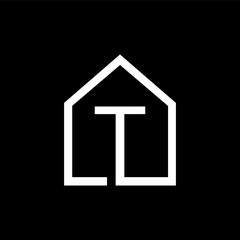 T letter house icon on black
