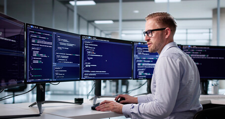 Portrait Of A Young Programmer Developing Software