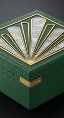 Elegant green leather box with art deco motif. Luxury packaging for gift or jewelry, a refined design for presentation.