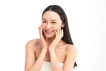 A beautiful young Asian woman with clean, fresh skin against a white background. Skincare, facial...