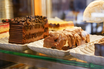 Delicious chocolate desserts displayed in a bakery showcase