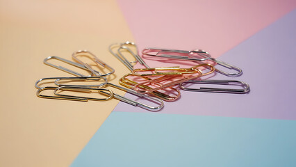  Colorful Paper Clips on Pastel Background