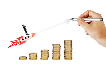 Businessman on rocket above coin stacks, hand drawing upward arrow, isolated on white background....