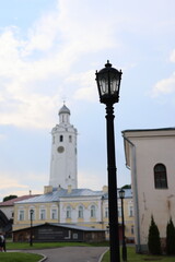 Obraz premium The Historic Tower and Lantern stand majestically in a charming urban setting, captivating visitors