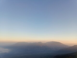 Fototapeta premium Golden Hour Over Majestic Mountain Range