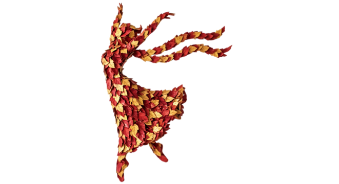 A dancing woman is made of red and gold autumn leaves isolated on transparent background
