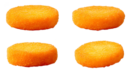 Four perfectly round dough balls prepared for baking in the kitchen.