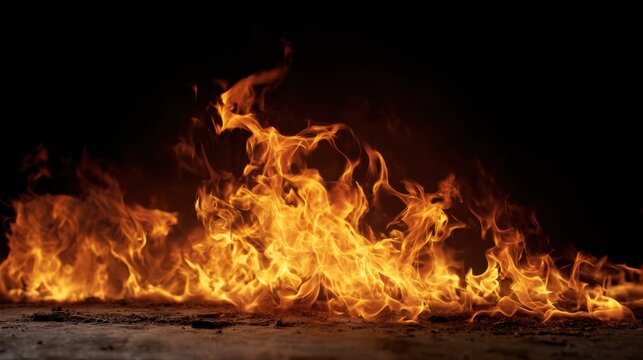 A vibrant display of flames dancing against a dark background, showcasing the beauty and power of fire in nature.