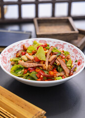 Jiangxi stir-fried lettuce and cured pork