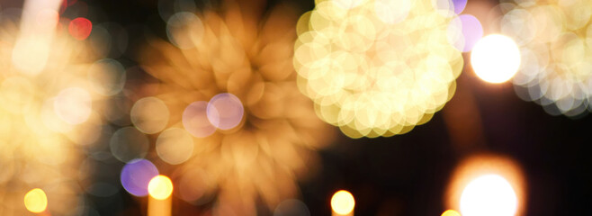 Banner Blurred background Gold Firework celebrate anniversary. Blurry gold firework night celebrate...