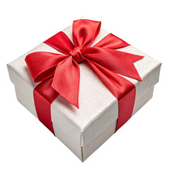 Fototapeta premium An elegant white gift box with a large, vibrant red satin ribbon bow, isolated on a white background for a special occasion.