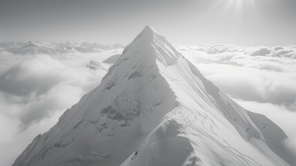 Aerial view snowy mountain peak clouds